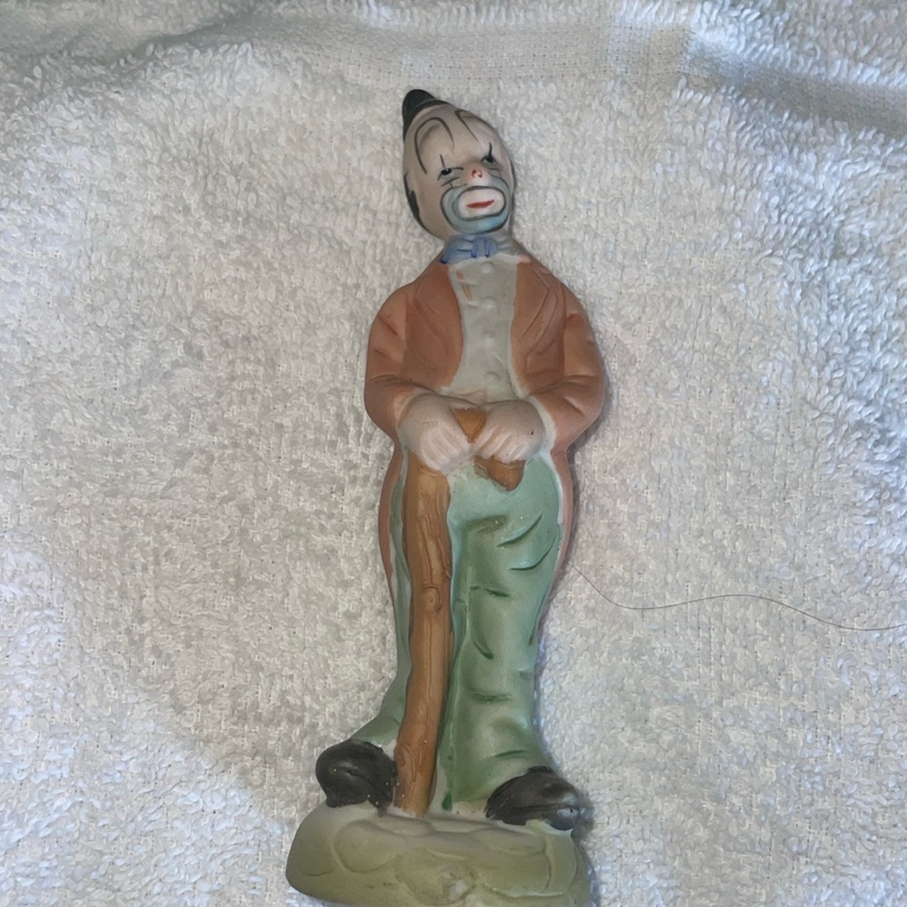 Vintage, smiling, ceramic clown 5 inch (H) 1 inch 1/2 (w)